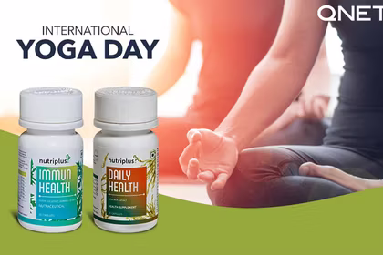 Indian couple doing yoga outdoors with Nutriplus DailyHealth and Nutriplus ImmunHealth in the frame