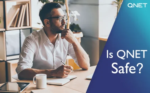 A young businessman wondering Is QNET safe.