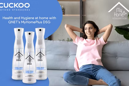Stress free Indian woman relaxing on a sofa while maintaining health and hygiene at home with MyHomePlus DSG