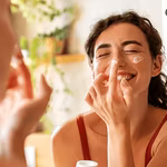 A young lady with her skin care routine
