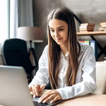 A young woman entrepreneur imbibing QNET's self development lessons