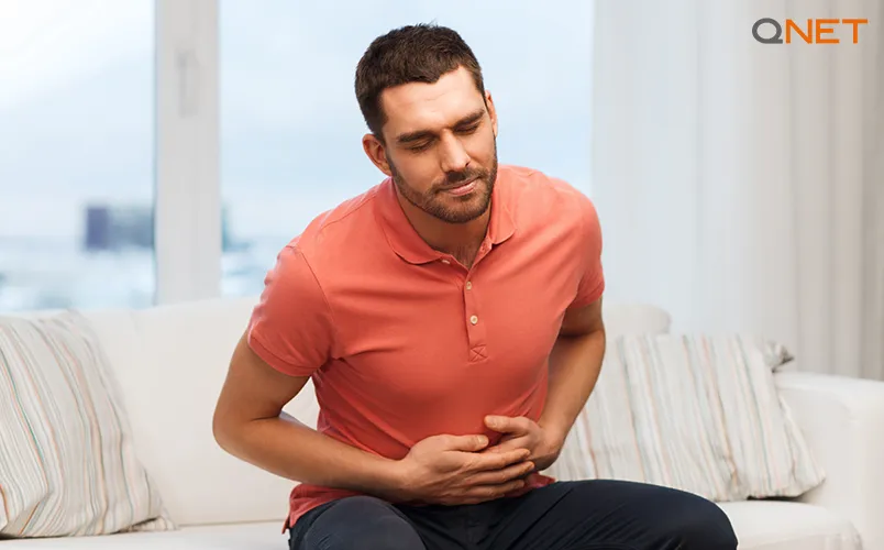 A Man suffering from gastric problems